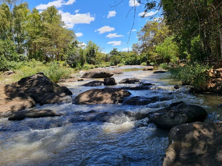 The Thiba River flowing beside camp grounds
